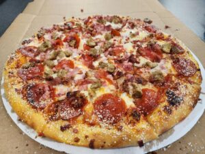 Embracing Community Spirit with Pizza: A Slice of Crossroads